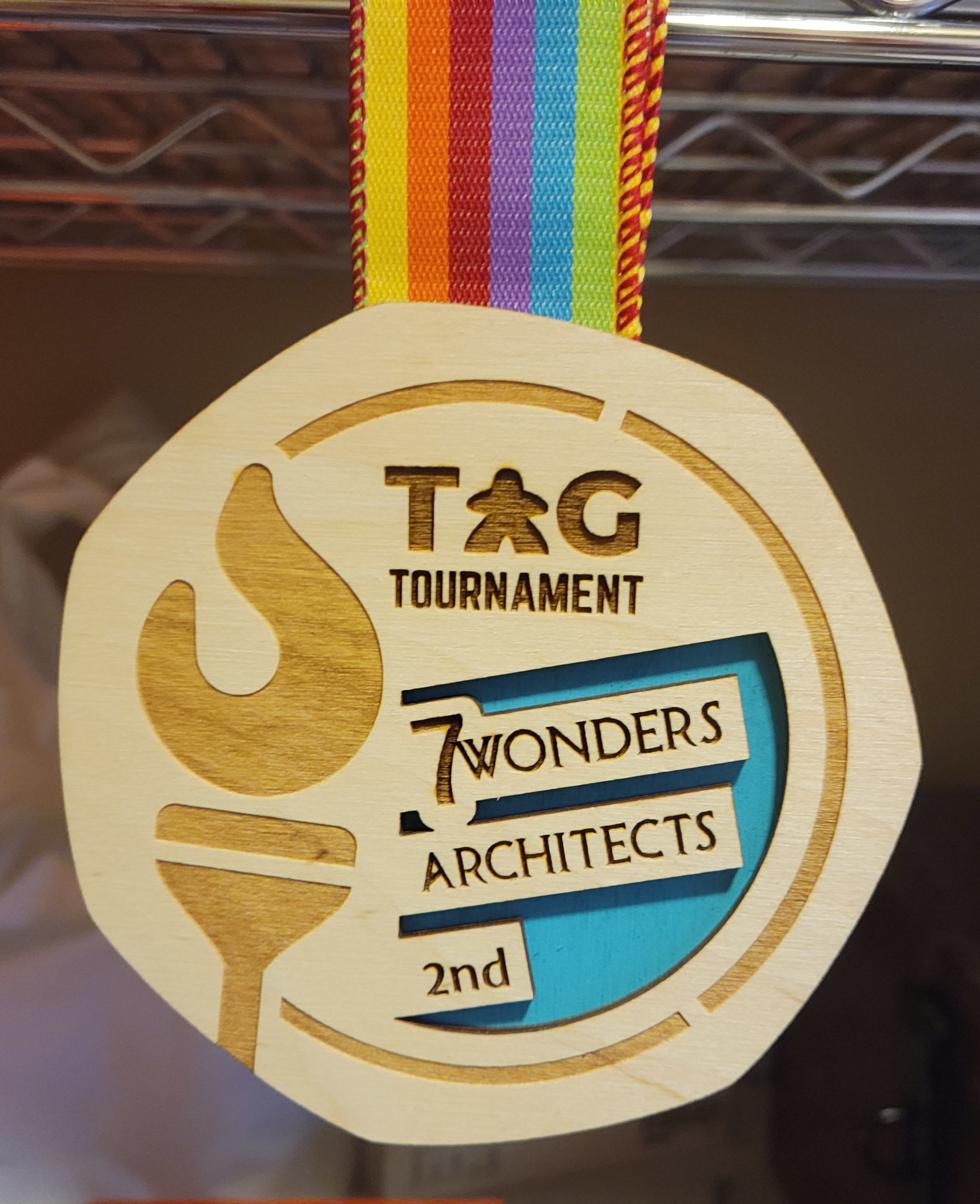 A tournament medal held up by a ribbon